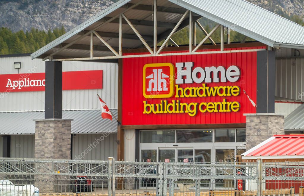 Radium, British Columbia, Canada. Apr 5, 2025. The exterior of a Home Hardware Building Centre shown on a bright day. A Canadian flag is visible near the entrance.