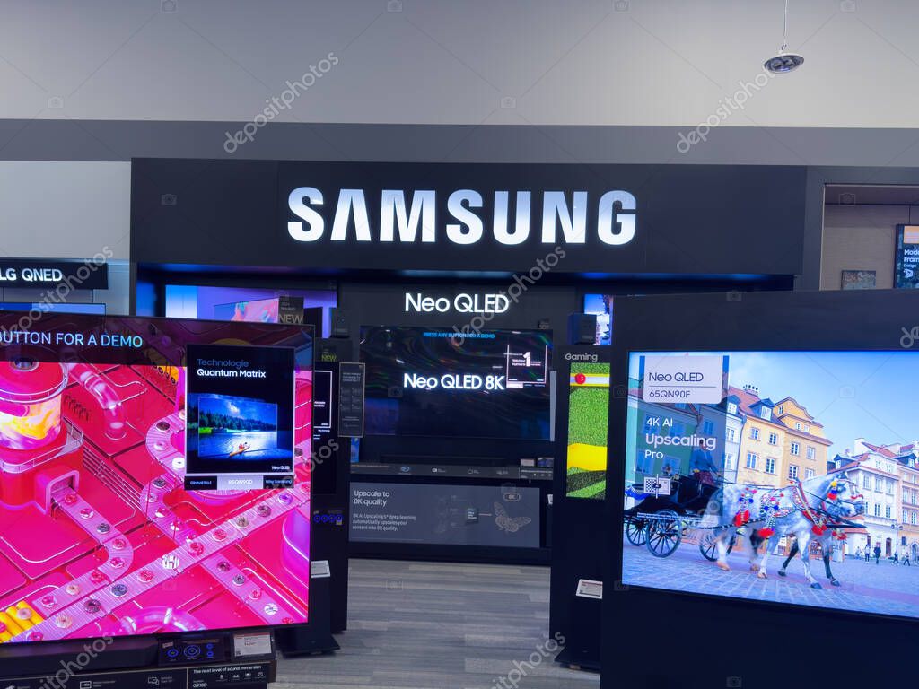 Calgary, Alberta, Canada. May 4, 2025. A Samsung display showcases Neo QLED 8K and Neo QLED TVs in a retail setting in Calgary, Alberta. The Samsung logo is prominently featured.