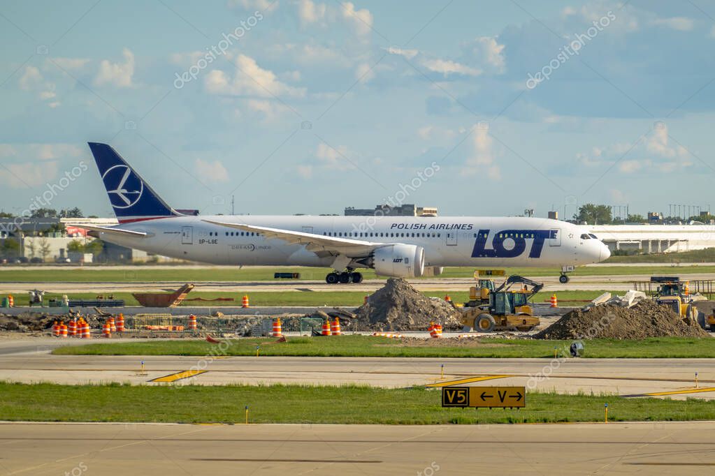 Chicago, Illinois, USA. Oct 4, 2025. LOT Polish Airlines Boeing 787 Dreamliner taxiing at an airport, showcasing modern air travel and ground operations.