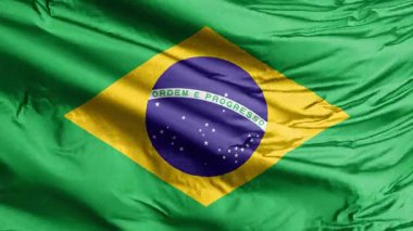 Canlı Brezilya bayrağı, yavaşça dalgalanıyor, yeşil, sarı ve mavi dizaynını 