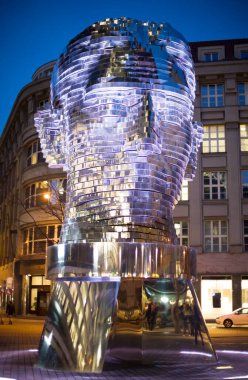 Prague, Czech Republic - February 9, 2025: A view of the famous kinetic sculpture Head of Franz Kafka in Prague. High-quality photo. clipart