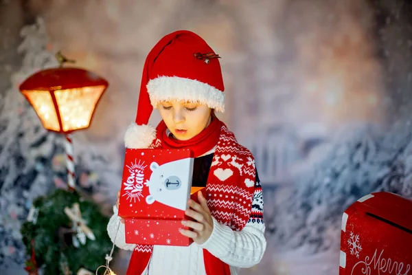 Cute Child School Boy Opening Present Christmas Decoration Him Outdoor — Stock Photo, Image