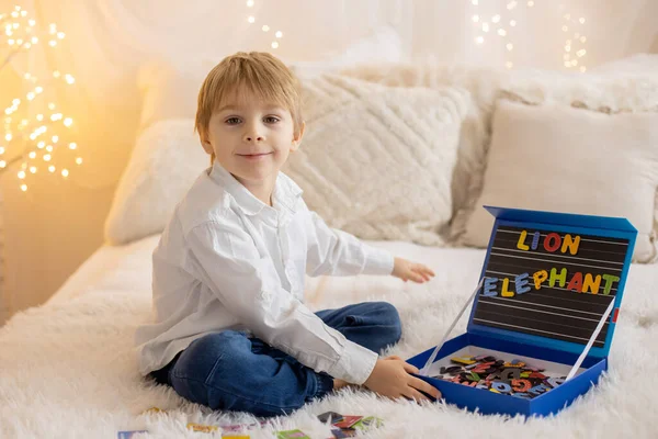 Cute Little Preschool Child Playing Alphabet Game Learning Letters Words — Foto de Stock