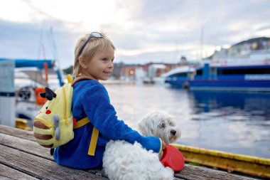 People, children enjoying the amazing views in Norway to fjords, mountains and other beautiful nature miracles