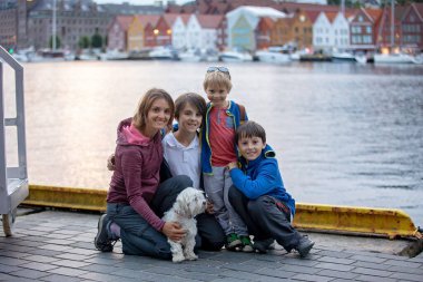 People, children enjoying the amazing views in Norway to fjords, mountains and other beautiful nature miracles