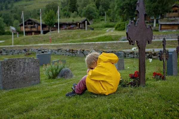 Sad Little Child Blond Boy Standing Rain Cemetery Sad Person — Stockfoto