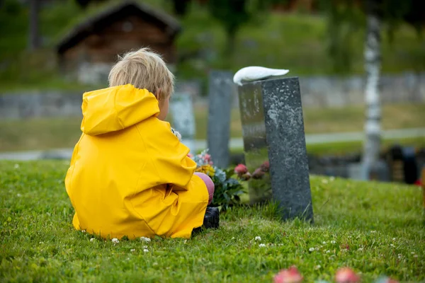 Sad Little Child Blond Boy Standing Rain Cemetery Sad Person — Fotografia de Stock