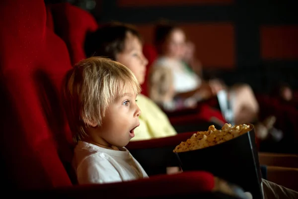 Cute Child Boy Watching Movie Cinema Eating Popcorn Enjoying Film — Zdjęcie stockowe