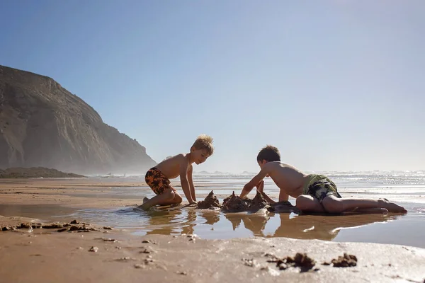 Happy Children Boys Playing Beach Sunset Kid Cover Sand Smile — Stock fotografie