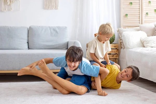 Happy Positive Children Tickling Feet Having Fun Together Boy Brothers — Stock Photo, Image