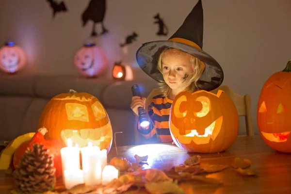 Child Cute Girl Playing Carved Pumpkin Home Halloween Night — Stock Photo, Image