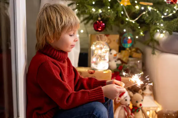 Cute Child Holding Sparkler New Year Eve Home Sitting Front — Stock Photo, Image