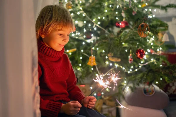 Cute Child Holding Sparkler New Year Eve Home Sitting Front — Stock Photo, Image