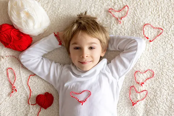 Cute Child Blond Boy Playing White Red Bracelet Martenitsa — Stock Photo, Image