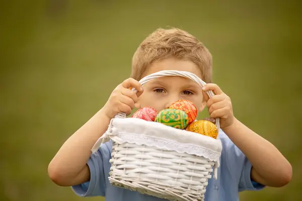 Cute Preschool Child Whipping His Sister Easter Twig Braided Whip — стокове фото