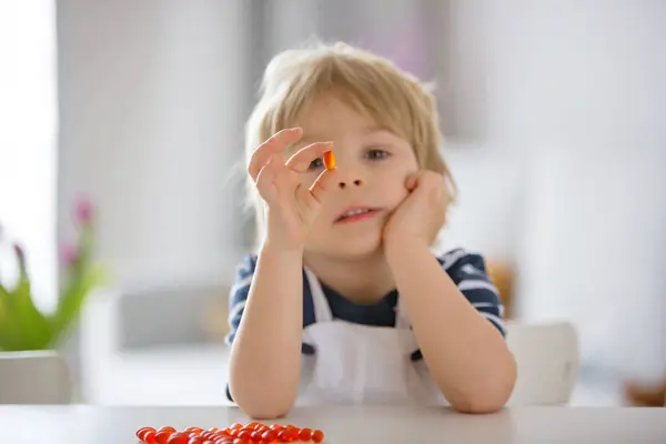 Cute Little Child Toddler Boy Eating Alfa Omega Child Supplement — Stock Photo, Image