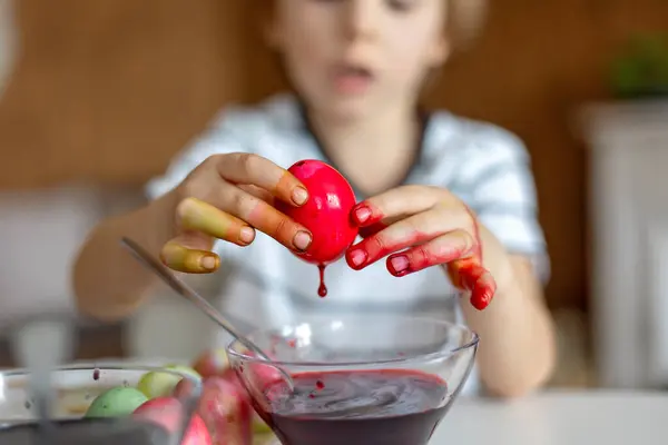 Beatiful Blond Child Boy Coloring Painting Eggs Easter Home Preparing — Stock fotografie