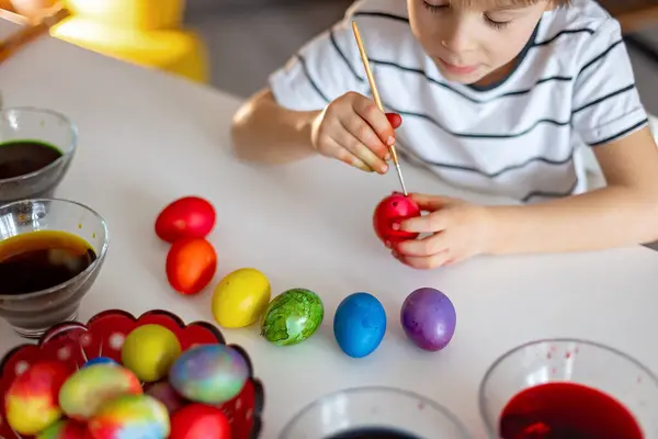 Beatiful Blond Child Boy Coloring Painting Eggs Easter Home Preparing — Stok fotoğraf
