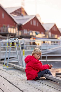 Family with children and pet dog, visiting nortern cities in Sweden, Lulea - the Lapland gem clipart