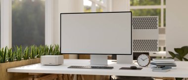 Şehirdeki en küçük ofis binası modern bilgisayar beyaz ekran maketi ve beyaz masadaki aksesuarlarla ortak çalışma alanı. Görüntüyü yaklaştır. 3d görüntüleme, 3d illüstrasyon