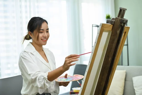 Beautiful Charming Millennial Asian Female Holding Palette Using Paintbrush Painting — Stock Photo, Image