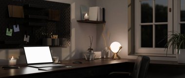 close-up image, Modern home workspace at night with laptop white screen mockup, table lamp, accessories and pegboard on the wall. 3d render, 3d illustration