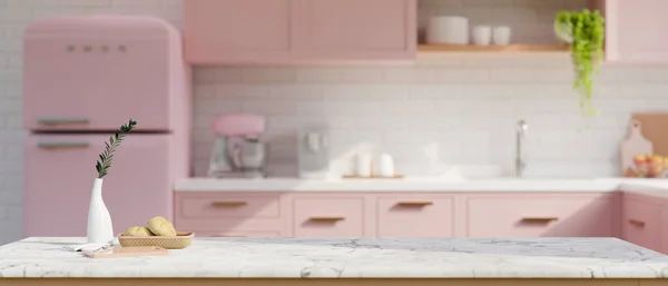 Copy space for product display on white marble tabletop with decor in beautiful pastel pink kitchen with pink kitchen cupboard, pink fridge and kitchen appliances. 3d render, 3d illustration