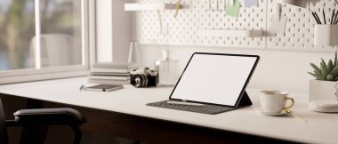Portable digital tablet white screen mockup with wireless keyboard is on modern minimal white table with stationery and accessories. close-up minimal white workspace. 3d render, 3d illustration
