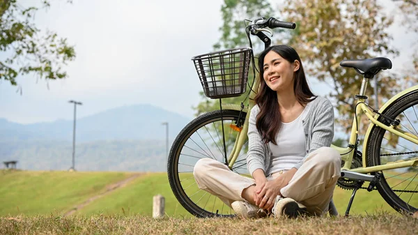 Relaxed Happy Young Asian Woman Casual Clothes Sits Grass Taking —  Fotos de Stock