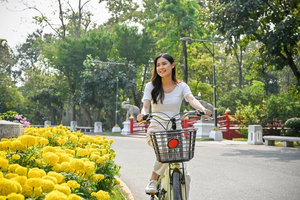 Charming Happy Young Asian Woman Enjoys Riding Bike Beautiful Public —  Fotos de Stock