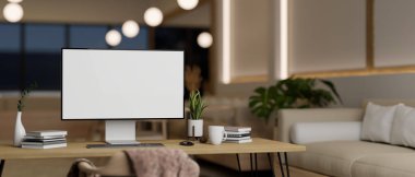 Workstation with PC desktop computer mockup and accessories on wood table in modern minimal bright living room with white couch and pendant lights. 3d render, 3d illustration