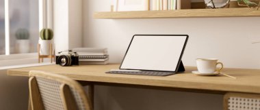 close-up image of a minimalist workspace with tablet white screen mockup, wireless keyboard, coffee cup, and decor on wood tabletop. 3d render, 3d illustration