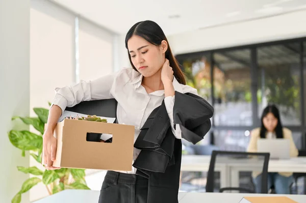 Sad Young Asian Female Office Worker Carrying Her Personal Stuff — Stock Fotó