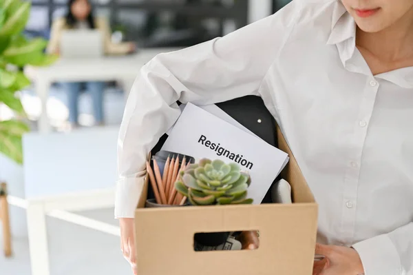 Cropped Shot Asian Female Office Worker Carrying Cardboard Box Her — Stockfoto
