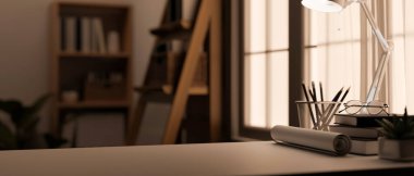 Copy space for product display on working table over blurred home office background with table lamp, a blue print roll or a paper roll, and stationery on table. 3d render, 3d illustration