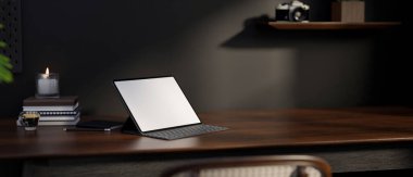 Siyah duvara karşı koyu ahşap masa üstünde kablosuz klavyeyle taşınabilir beyaz tabletin yakın plan görüntüsü. Modern tavan arası çalışma alanı. 3d görüntüleme, 3d illüstrasyon