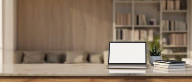 Dizüstü bilgisayarlı beyaz ekran maketi, kitap yığını, dekor bitkisi ve arka plandaki bulanık oturma odasındaki ürün gösterimi için kopya alanı. 3d görüntüleme, 3d illüstrasyon