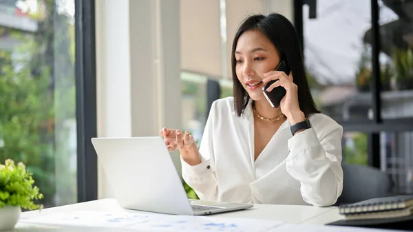 Professional Confident Millennial Asian Businesswoman Talking Phone Her Client While — Stock Photo, Image