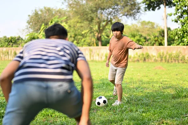 Cheerful Young Asian Boy Playing Football His Dad Backyard Having — Stock Photo, Image