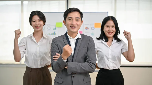 Group Successful Professional Asian Businesspeople Standing Office Showing Clenched Fists — Stock Photo, Image