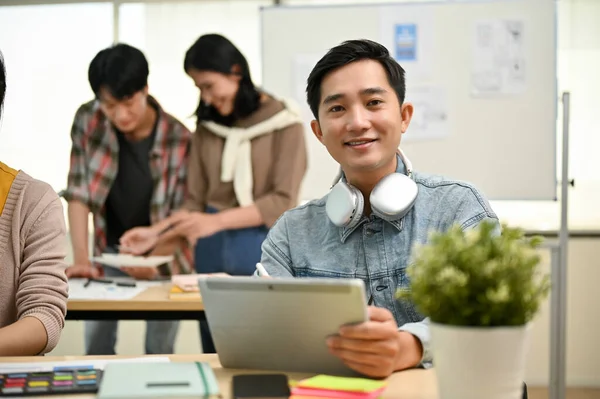 Smiling Professional Millennial Asian Male Worker Tech Startup Team Sits — Stock Photo, Image