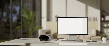 Modern bir ofis masası çalışma alanı bilgisayar beyaz ekran maketi, modern VR gözlükleri ve aksesuarları var. 3d görüntüleme, 3d illüstrasyon