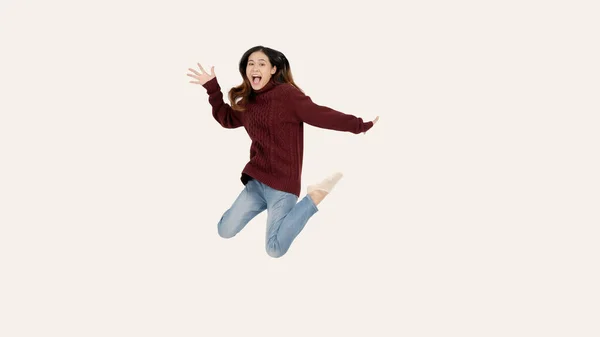 Overjoyed Pretty Asian Woman Red Sweater Jumping Joy Isolated White — Stock Photo, Image