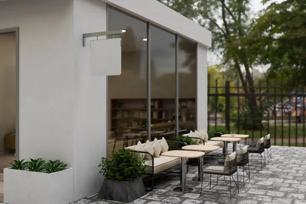 A modern and comfortable cafe or restaurant outdoor seating area with a greenery atmosphere, a blank signage mockup hanging on the wall. 3d render, 3d illustration