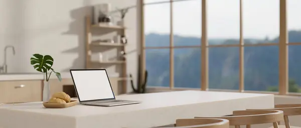 在一间现代化 简朴的厨房里 一个白色餐桌上的白屏笔记本电脑被模仿 家庭工作空间的概念 3D渲染 3D说明 — 图库照片