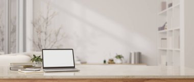 Beyaz ekran dizüstü bilgisayarı, kitapları, saksı bitkisi olan beyaz mermer bir masa ve arka planda bulanık beyaz bir oturma odasının üzerine kopyalama alanı. Ev işi konsepti. 3d görüntüleme, 3d illüstrasyon