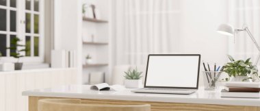 Modern, beyaz bir oturma odasındaki beyaz bir masanın üstünde beyaz ekran dizüstü bilgisayar ve aksesuarlar. Ev işi konsepti. 3d görüntüleme, 3d illüstrasyon