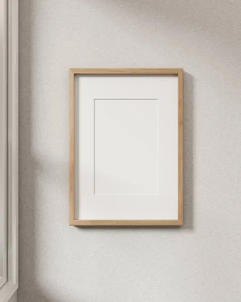 A minimalist wood picture frame mockup hanging on a white wall in a modern Scandinavian room. close-up image. 3d render, 3d illustration