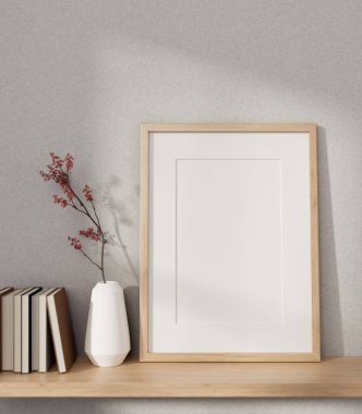 Beyaz duvarın karşısındaki ahşap bir duvarda boş bir resim çerçevesi, kitaplar ve seramik bir vazo. Ön görüntü görüntüsü. 3d görüntüleme, 3d illüstrasyon