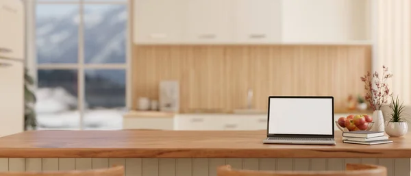 在现代斯堪的纳维亚式厨房的木制厨房台面或岛上的一台白屏笔记本电脑 3D渲染 3D说明 — 图库照片